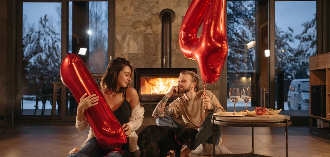 twin flame couple holding numbers representing their combined life path number