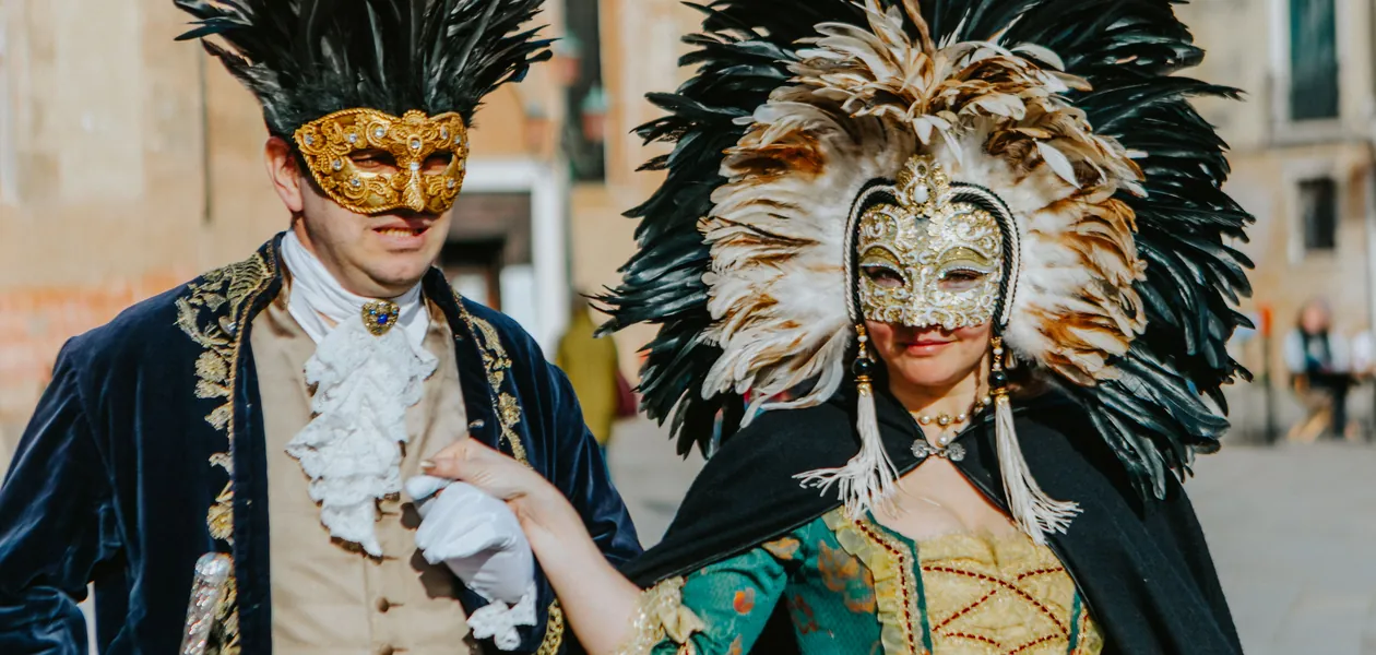 couple in elaborate masks at the venetian carnival